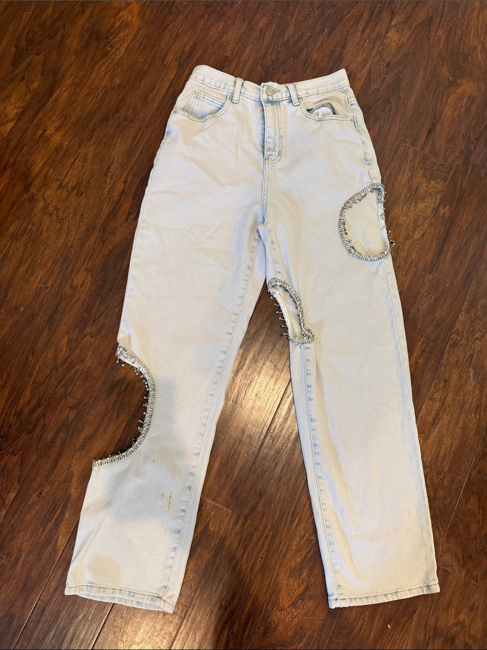 Light Blue Straight Leg Jeans with Distinct Cutout Trim